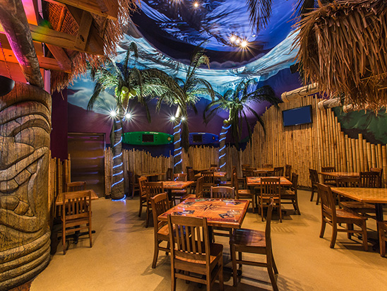 TIKI DINING interior with wooden chairs and table